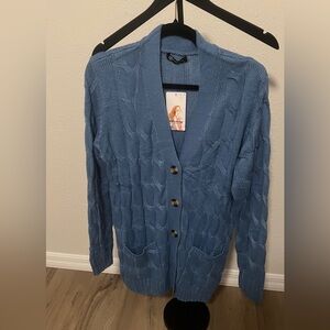 Classic Blue Cable Knit Cardigan front pockets